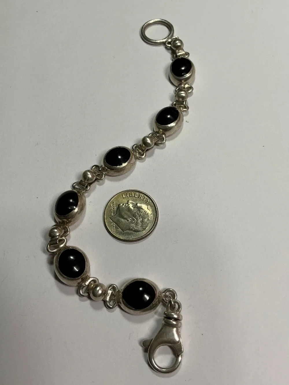 Sterling Silver Oval Shaped Black Onyx Link Bracelet. 7 inches long